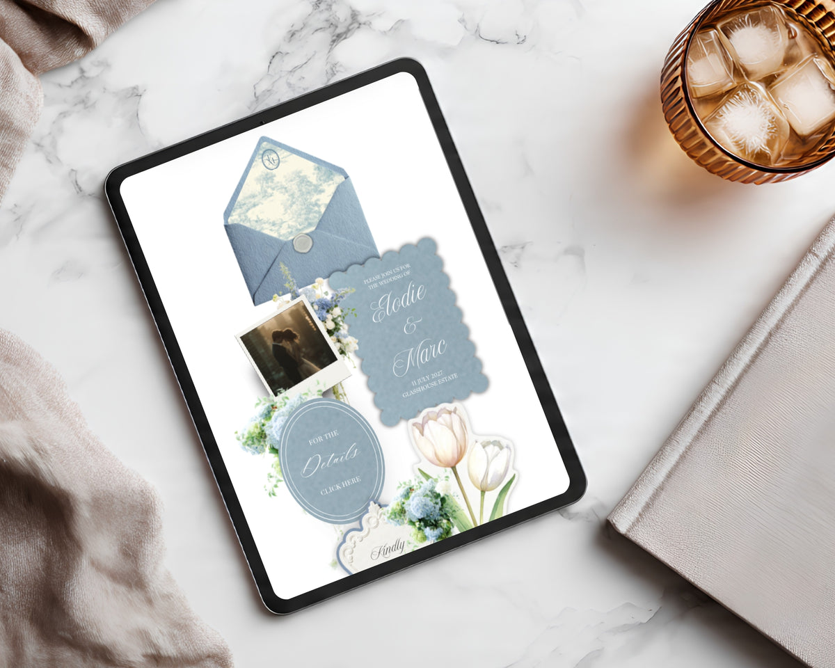 Dusty Blue French Toile wedding website shown on a tablet flat-lay