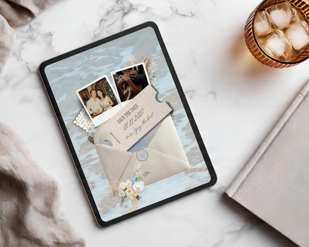 Beach save the date website template on a tablet, styled on marble beside a cocktail glass.